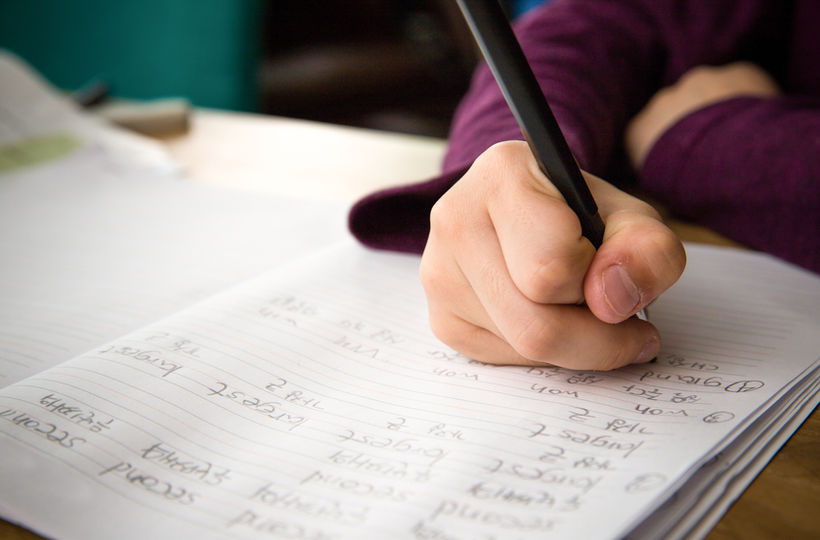 Handwriting practice materials on a desk